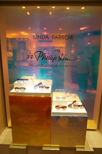 Linda Farrow sunglasses display in Selfridges London. Check out this Doro Tape dichroic colour changing film at Retail Design Expo 