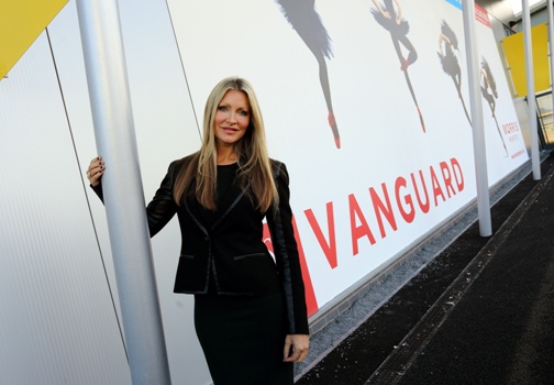Supermodel-turned-businesswoman Caprice at the Morris & Company launch, with graphics from Hollywood Monster, produced using CMYUK’s UTACK Multisurface wallpaper