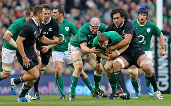 brian odriscoll supported by paul oconnell tackled by luke romano